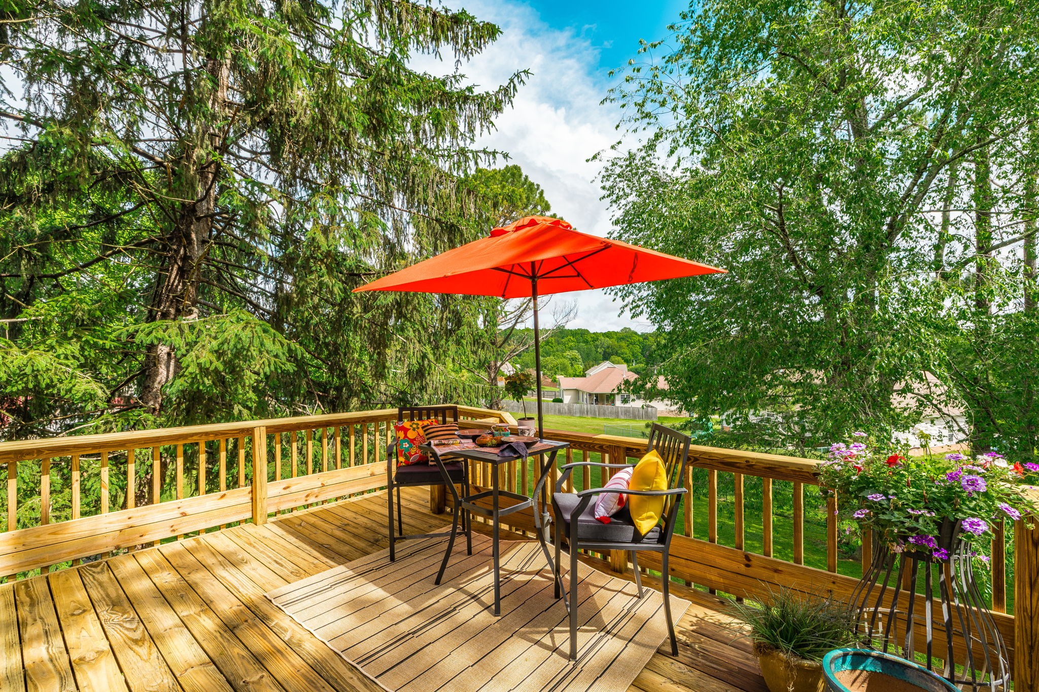 405 Timberlake Drive Springfield, TN 37172 - Photo 9 of 46 a view of a chairs and table on the wooden deck