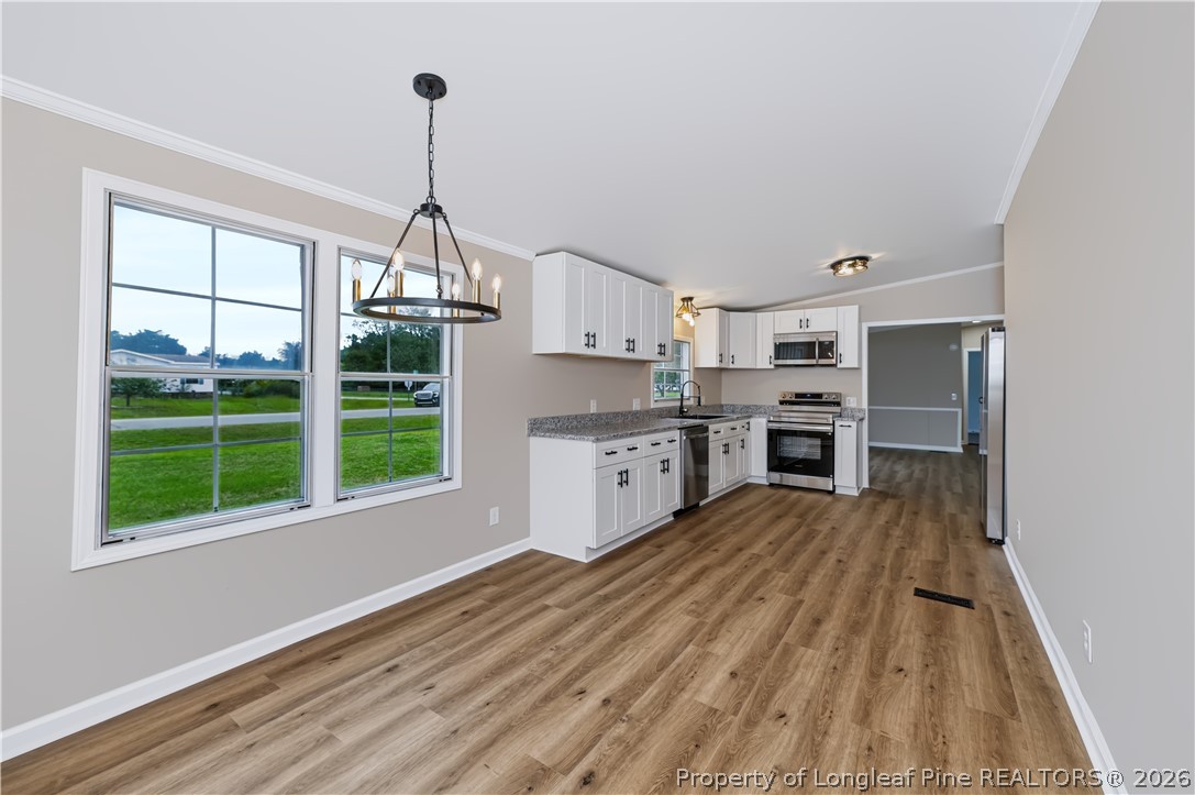 6716 Tennis Drive Stedman, NC 28391 - Photo 12 of 24 DR to Kitchen