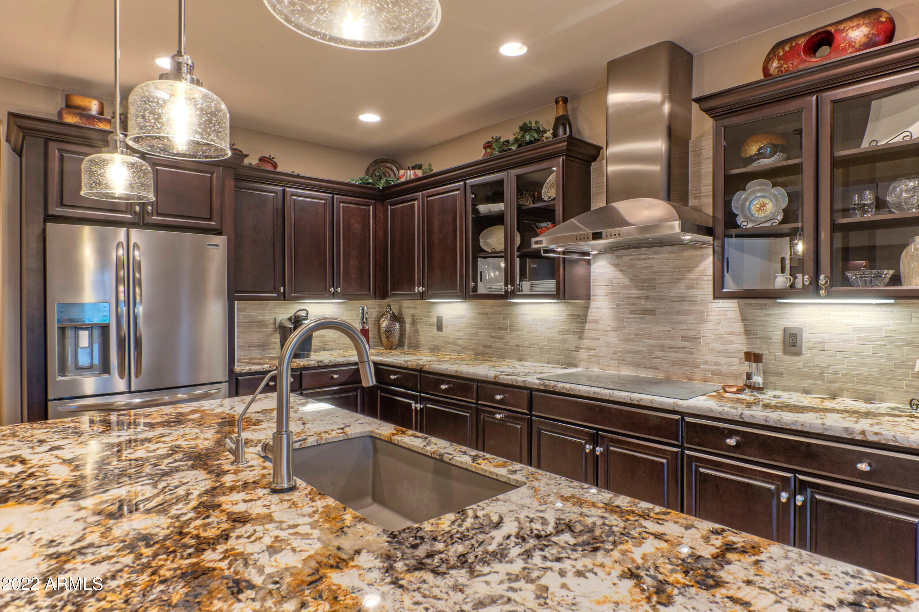 16492 West Berkeley Road Goodyear, AZ 85395 - Photo 16 of 29 Rich granite counters