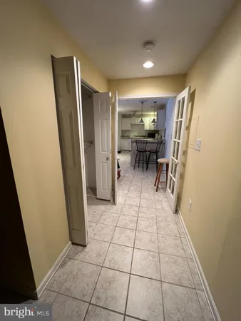 a view of kitchen with furniture and window