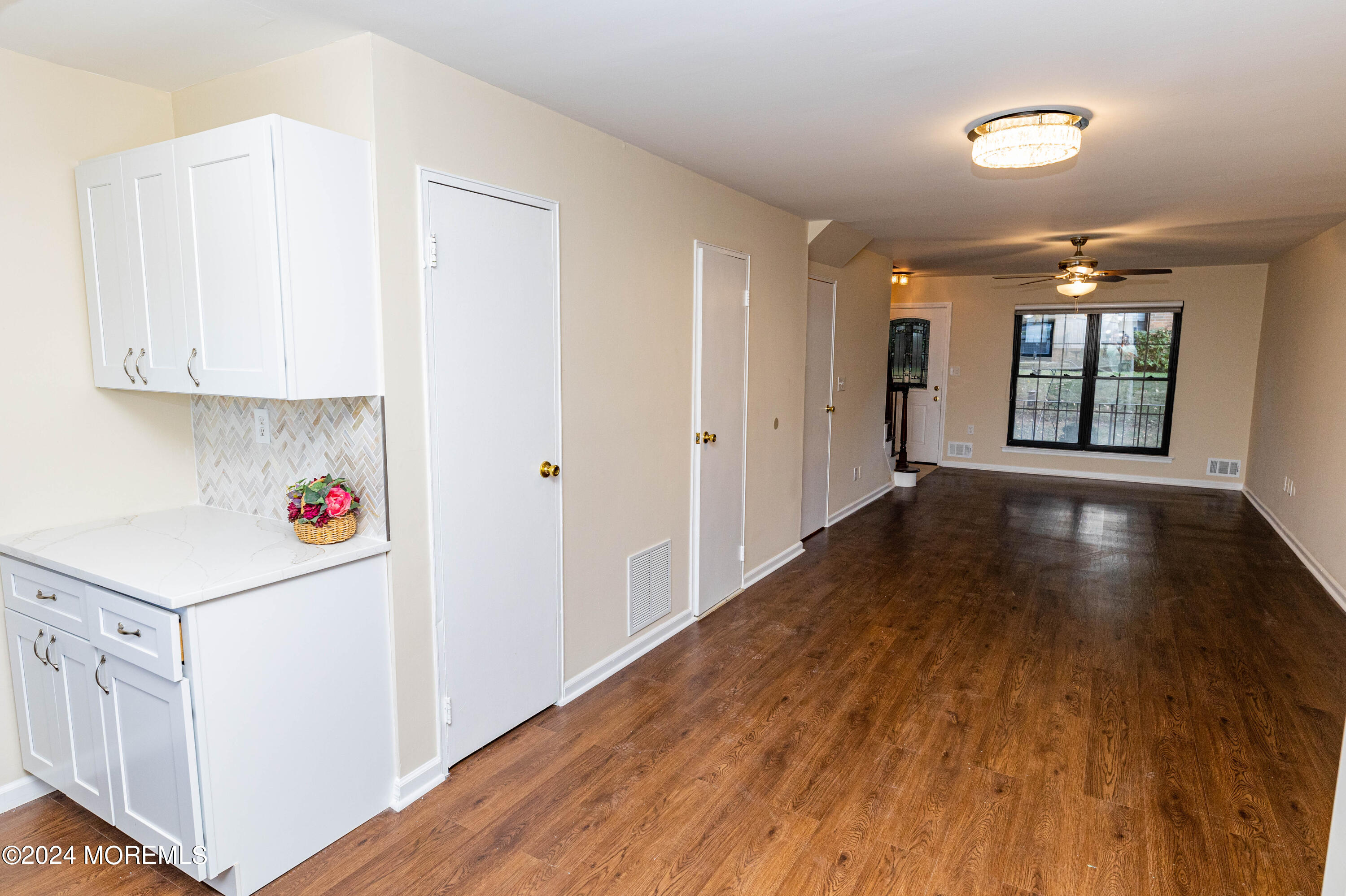 301 Spring Street, Unit 11 Red Bank, NJ 07701 - Photo 11 of 40 a view of an entryway with wooden floor