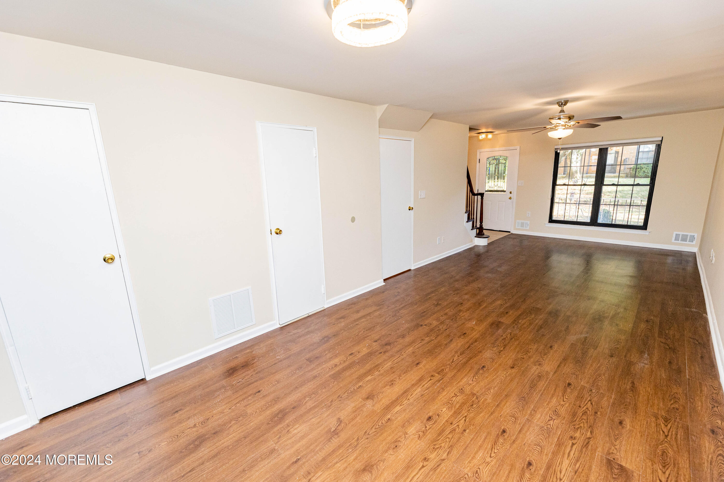 301 Spring Street, Unit 11 Red Bank, NJ 07701 - Photo 12 of 40 a view of a room with wooden floor and window