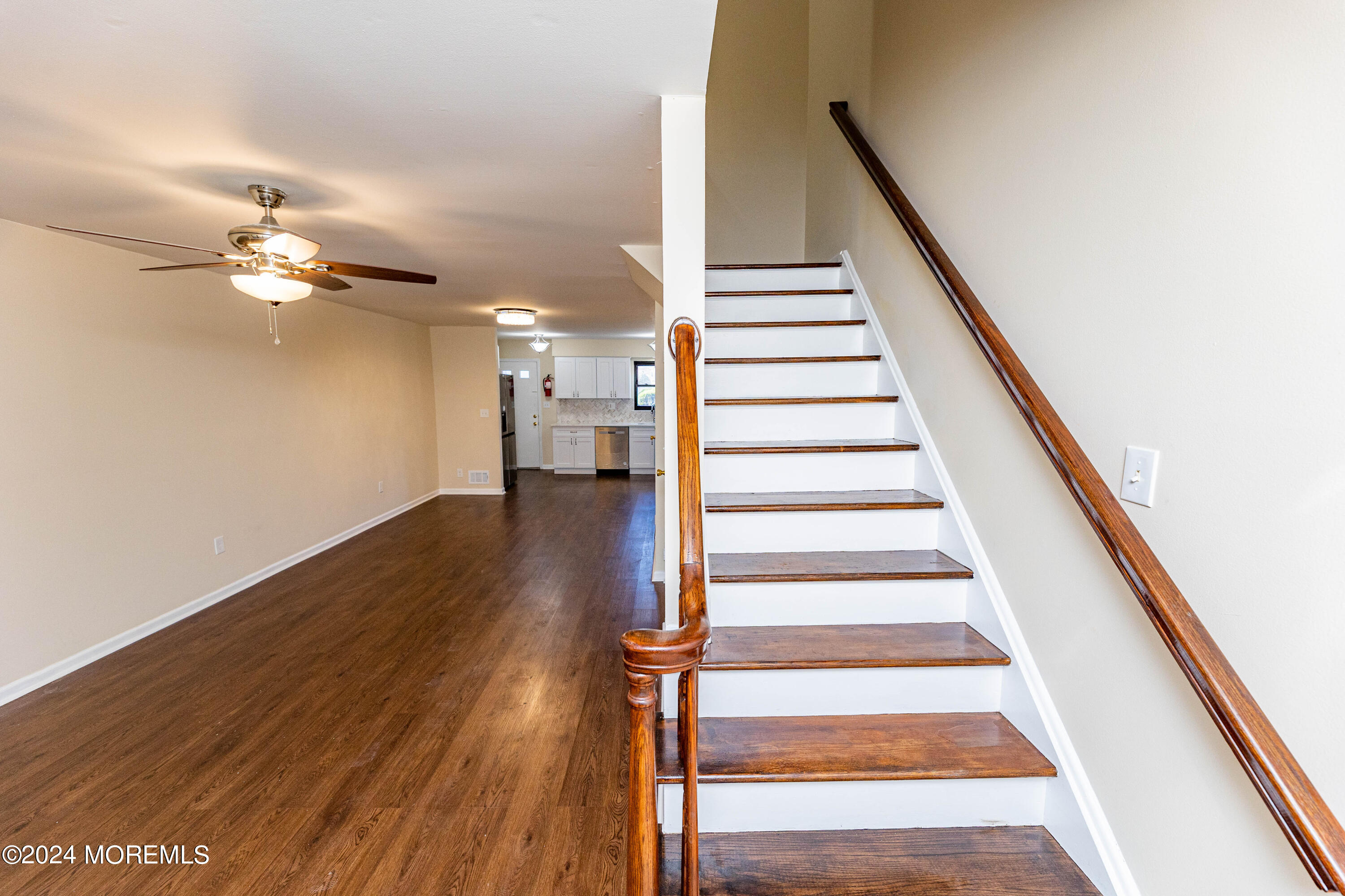 301 Spring Street, Unit 11 Red Bank, NJ 07701 - Photo 15 of 40 a view of entryway and hall with wooden floor