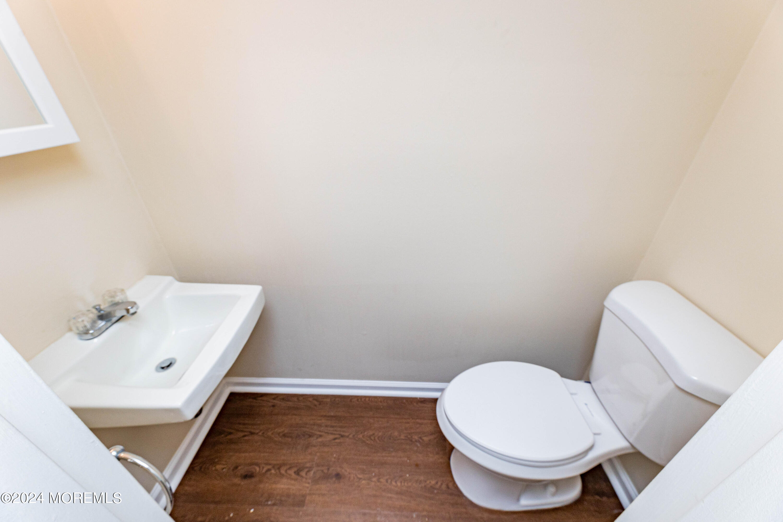 301 Spring Street, Unit 11 Red Bank, NJ 07701 - Photo 25 of 40 a bathroom with a toilet and a sink