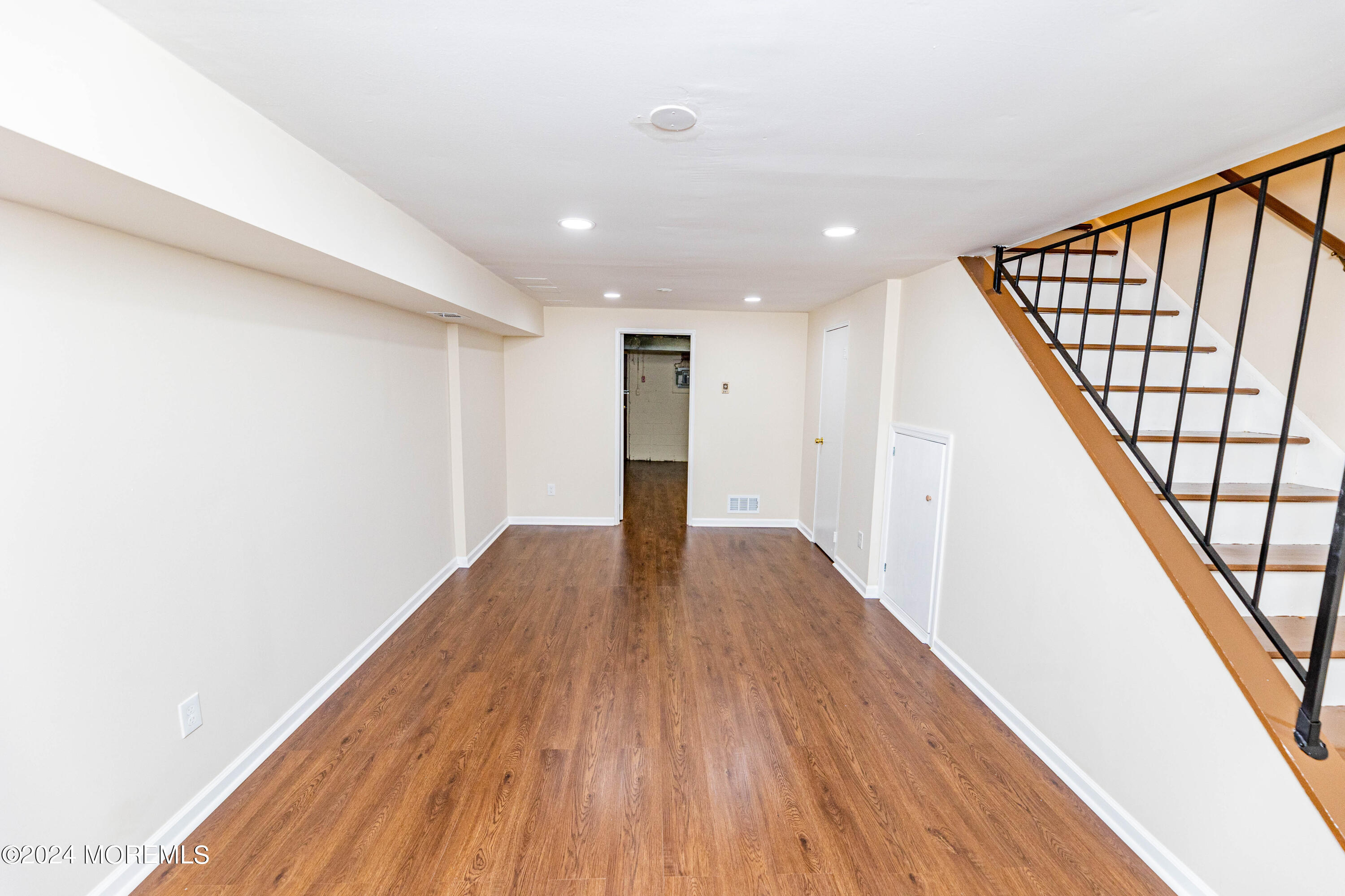 301 Spring Street, Unit 11 Red Bank, NJ 07701 - Photo 29 of 40 a view of entryway with wooden floor