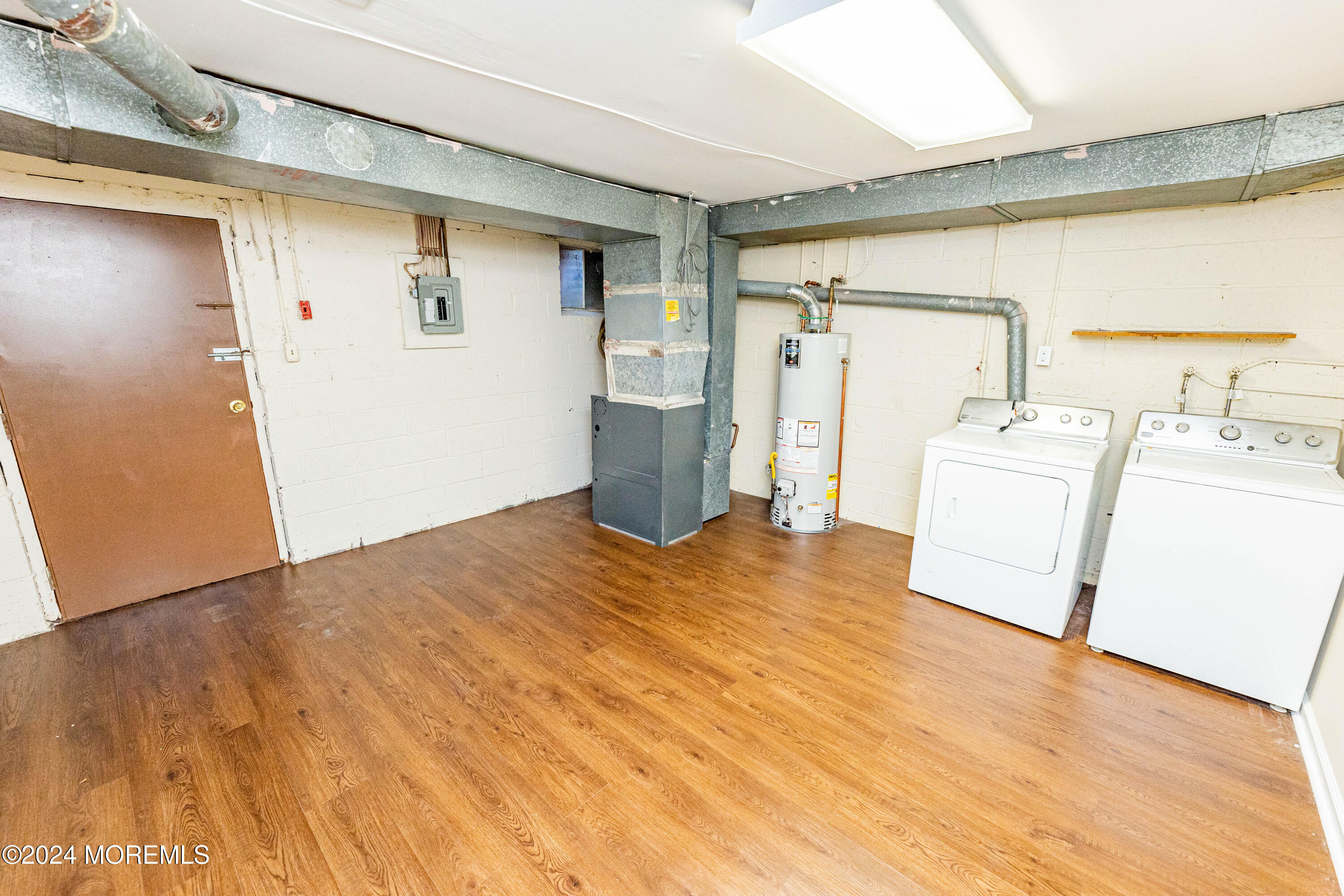 301 Spring Street, Unit 11 Red Bank, NJ 07701 - Photo 35 of 40 a view of a storage & utility room with a sink