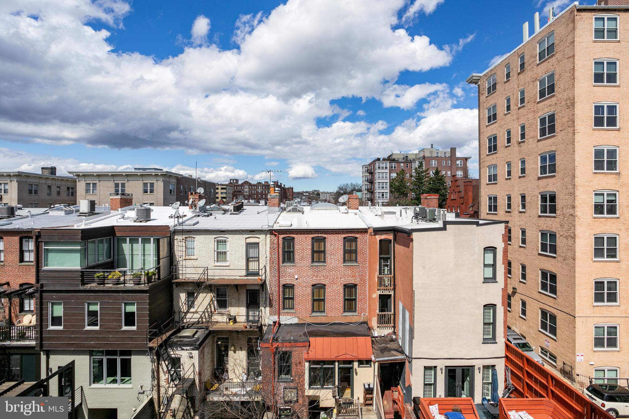 1619 R Street Northwest, Unit 404 Washington, DC 20009 - Photo 18 of 24 a view of a building with a lot of windows