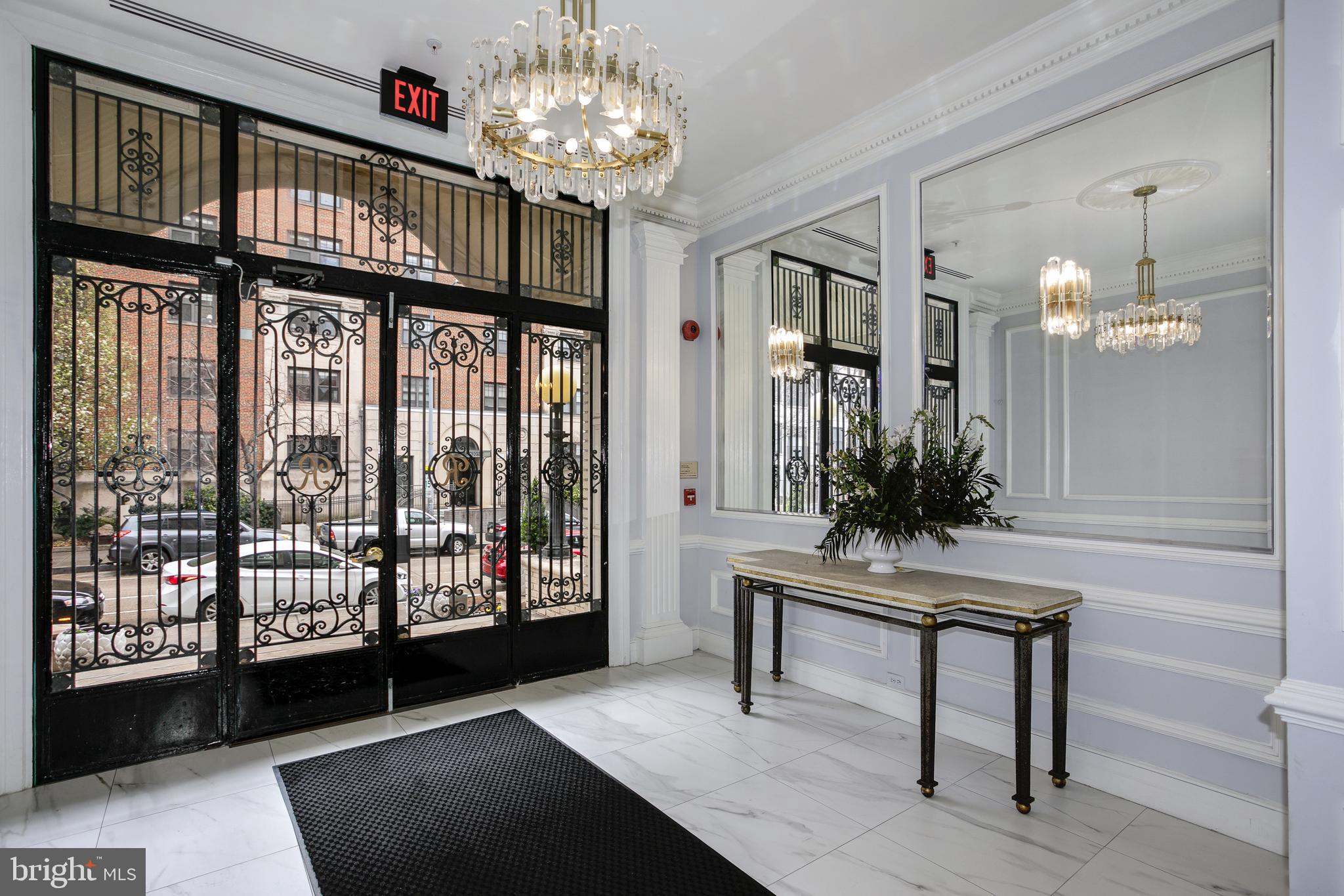 1619 R Street Northwest, Unit 404 Washington, DC 20009 - Photo 19 of 24 a view of a livingroom with furniture window and wooden floor