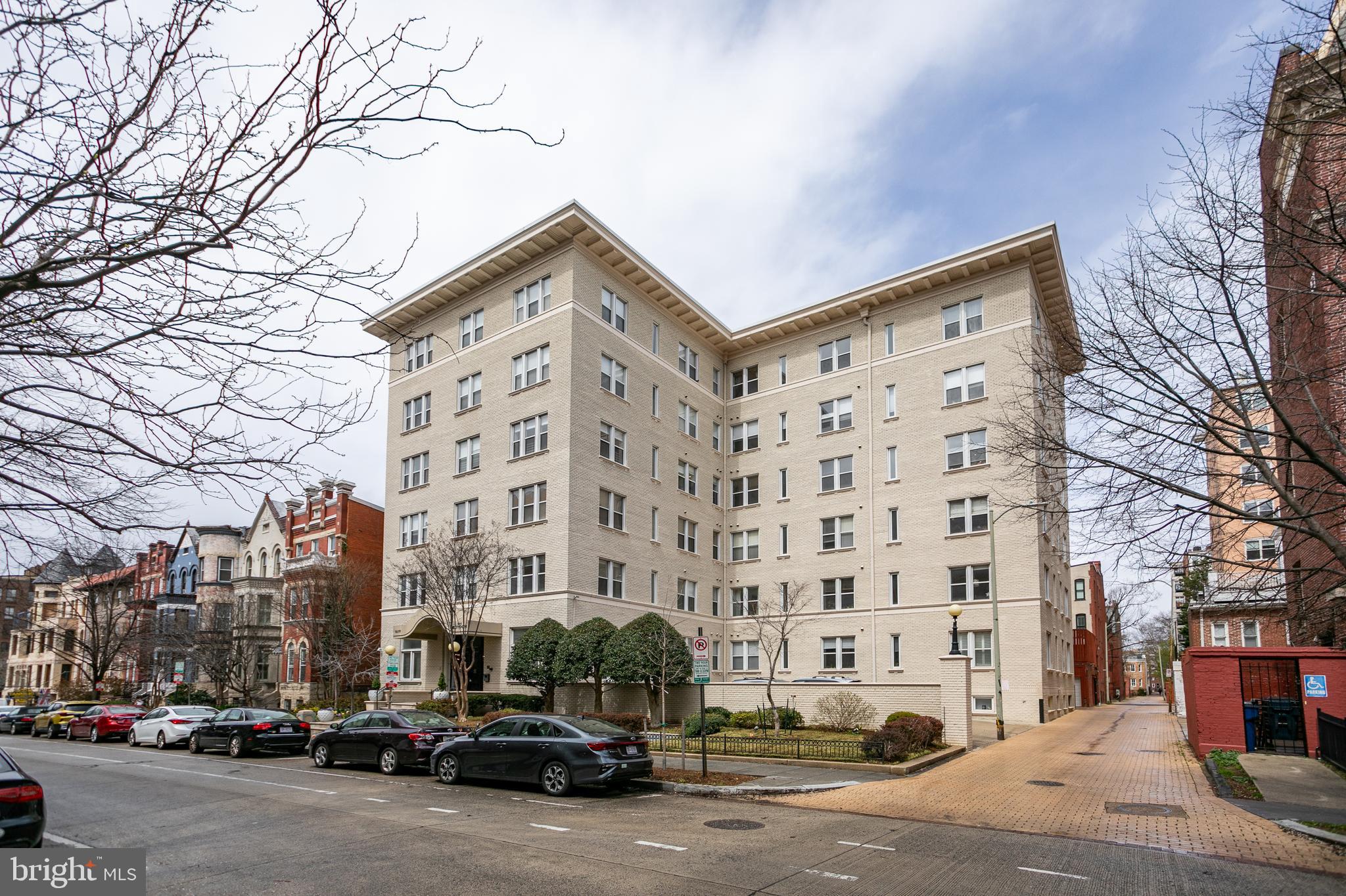 1619 R Street Northwest, Unit 404 Washington, DC 20009 - Photo 21 of 24 a car parked in front of a building