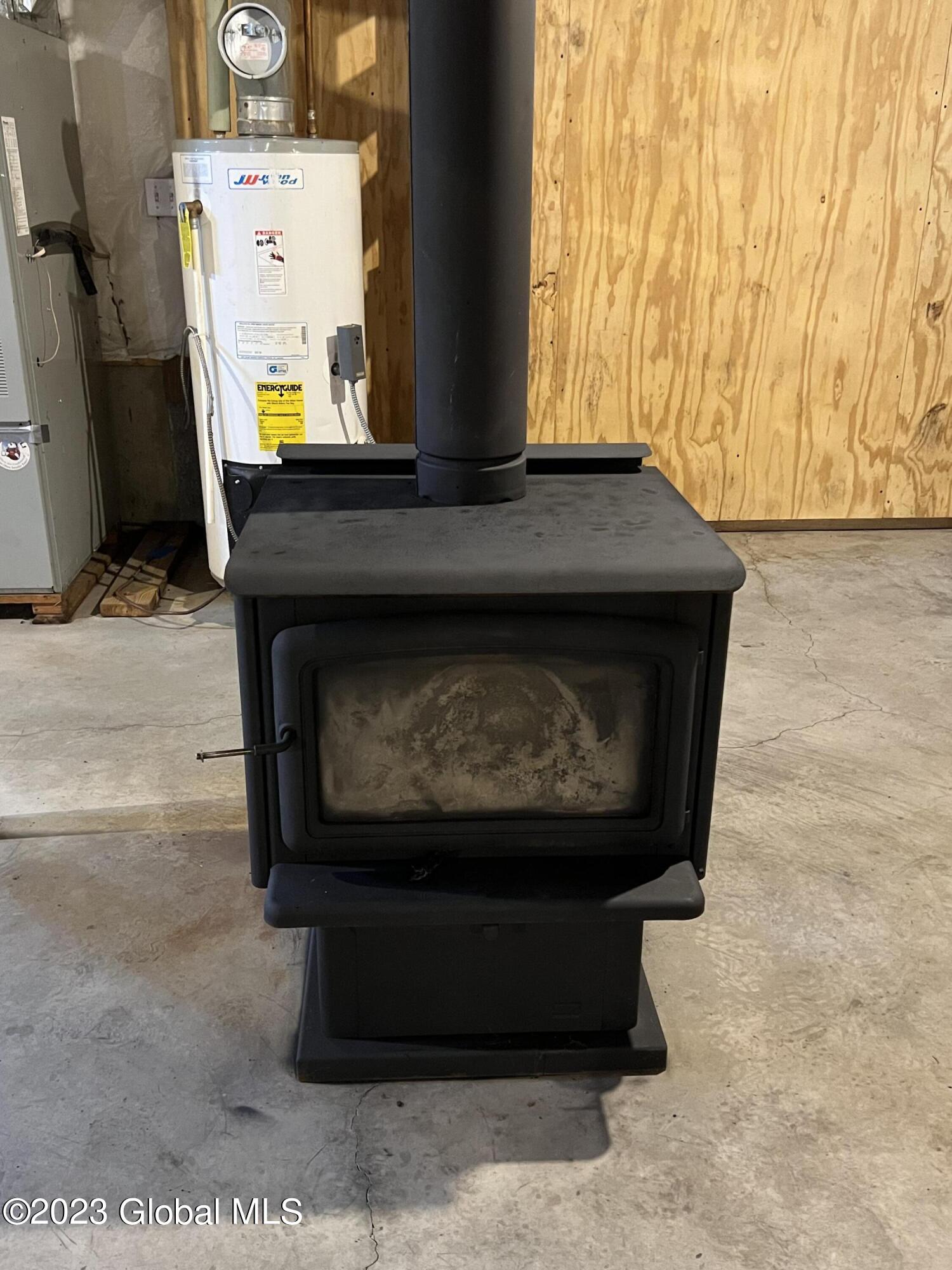 327 Buckley Road Whitehall, NY 12887 - Photo 37 of 38 Basement Woodstove