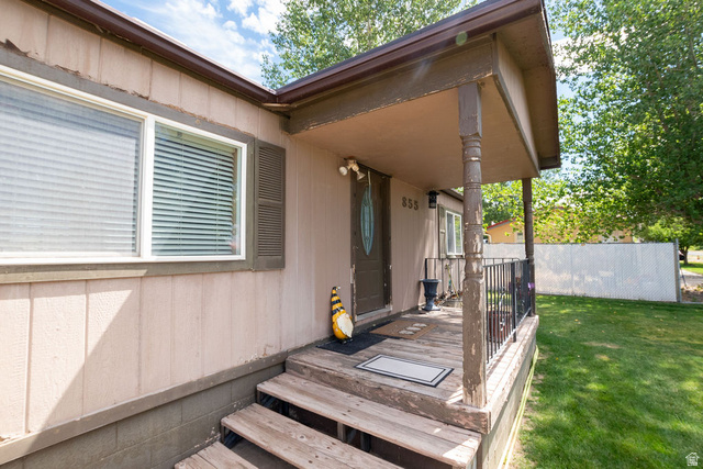 855 East 300 N Street Beaver, UT 84713 - Photo 6 of 44 Front porch entrance featuring wood steps and a covered patio area