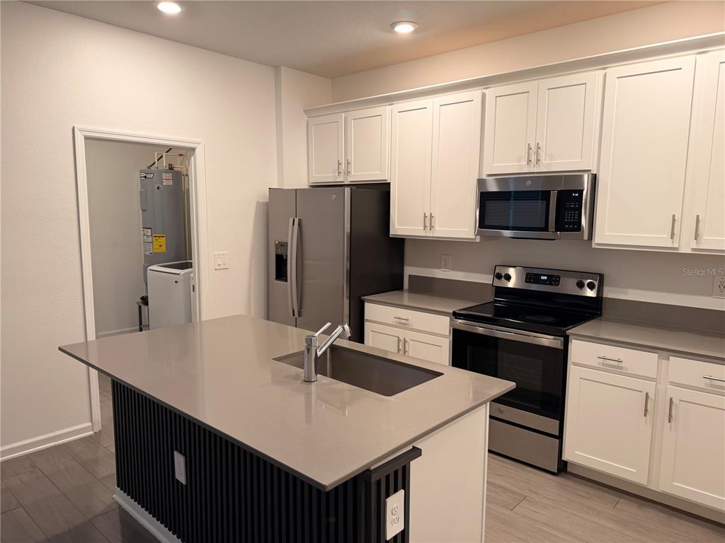 1687 Contentment Loop Kissimmee, FL 34744 - Photo 4 of 36