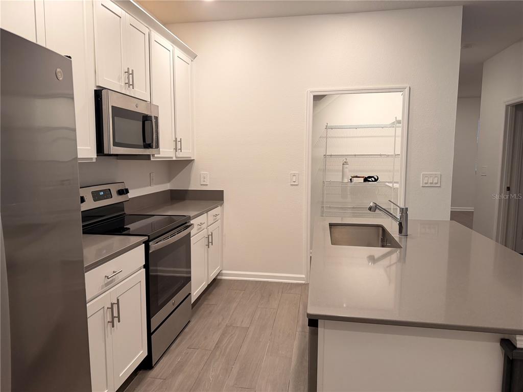 1687 Contentment Loop Kissimmee, FL 34744 - Photo 5 of 36