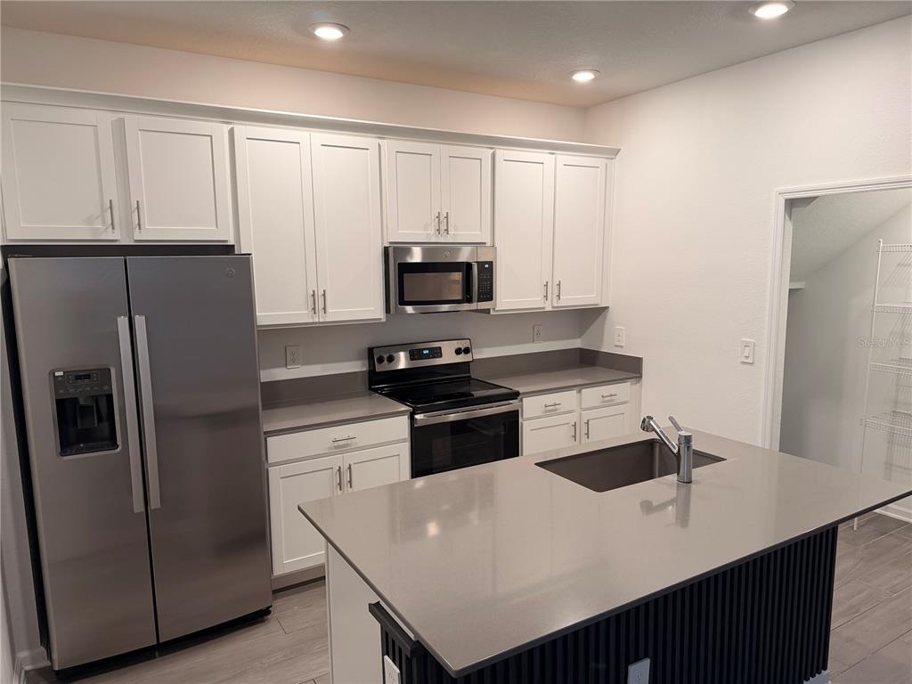 1687 Contentment Loop Kissimmee, FL 34744 - Photo 6 of 36