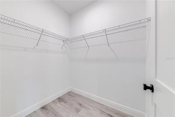 a view of a room with racks on the wall