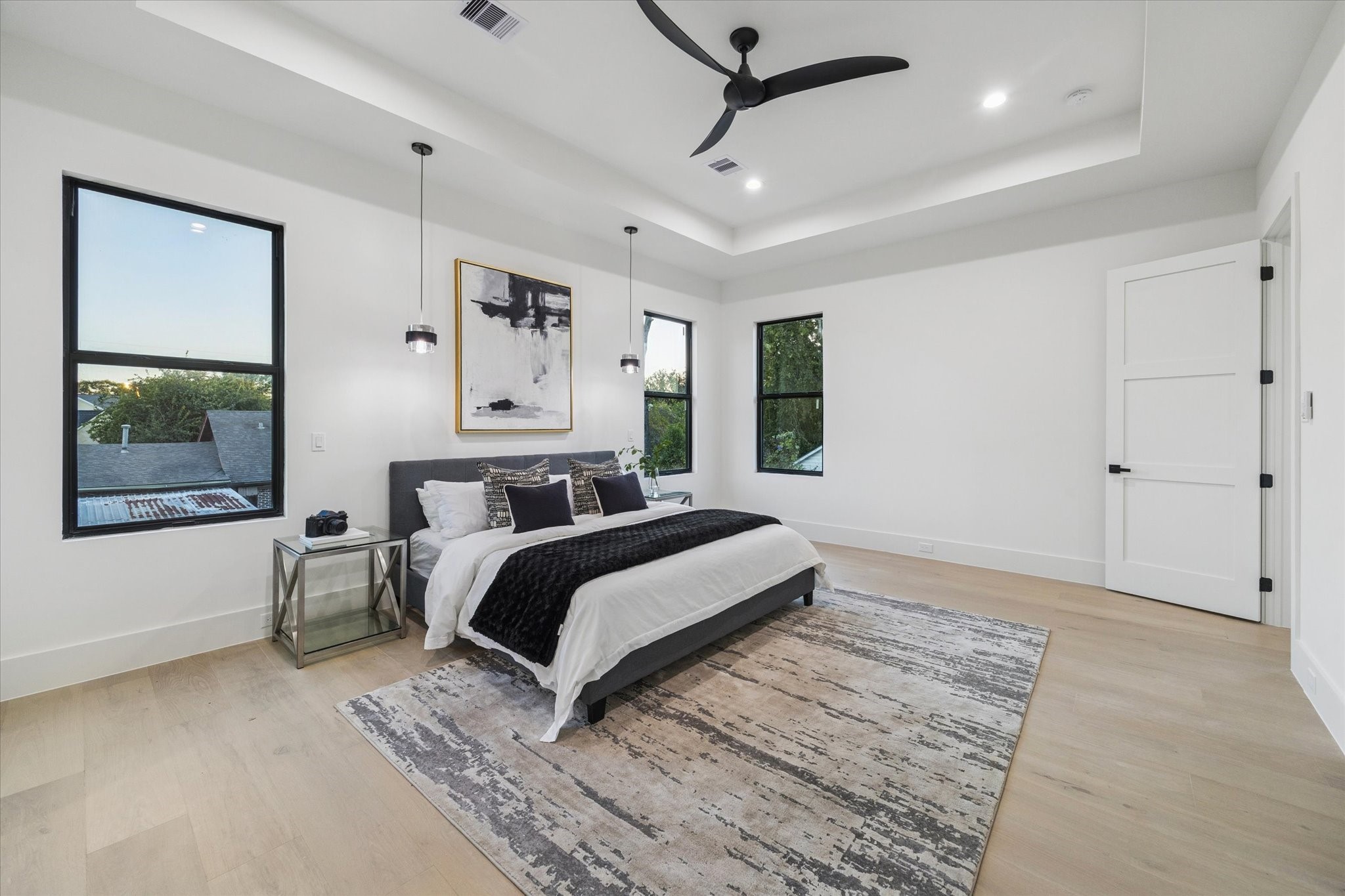 614 Eleanor Street Houston, TX 77009 - Photo 20 of 38 a bedroom with a large bed and a window