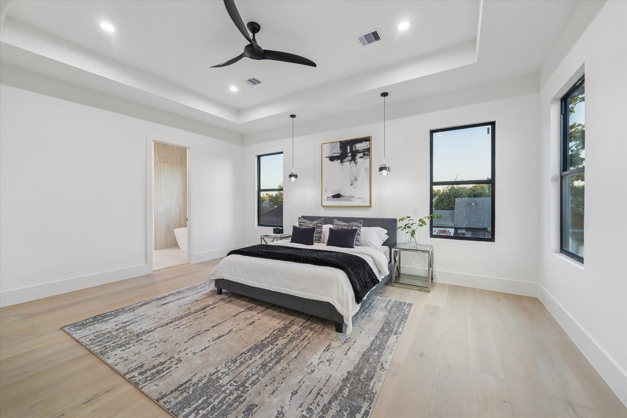 614 Eleanor Street Houston, TX 77009 - Photo 21 of 38 a bedroom with a large bed and a window