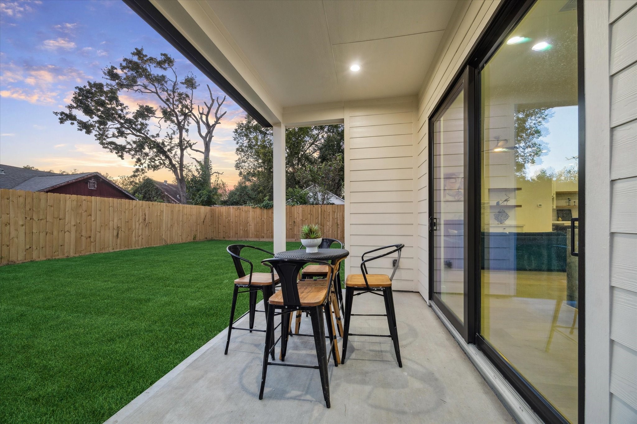 614 Eleanor Street Houston, TX 77009 - Photo 36 of 38 a view of a porch with chairs and backyard