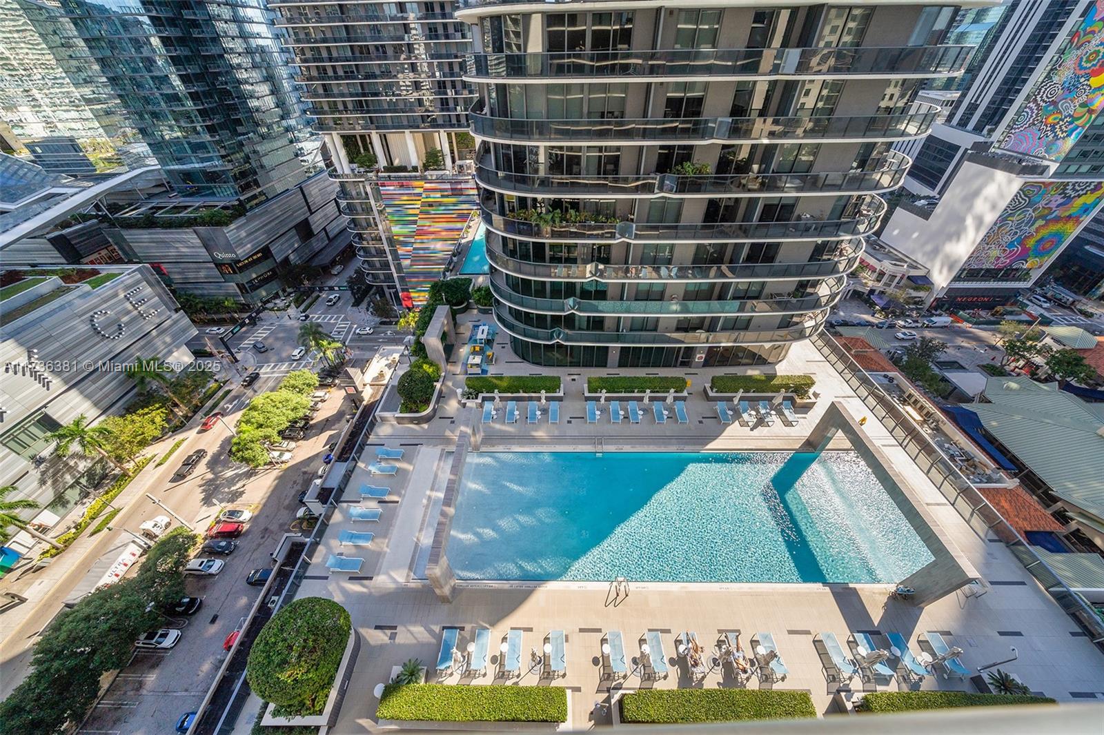 55 Southwest 9th Street, Unit 1701 Miami, FL 33130 - Photo 32 of 58 a view of a swimming pool with sitting area