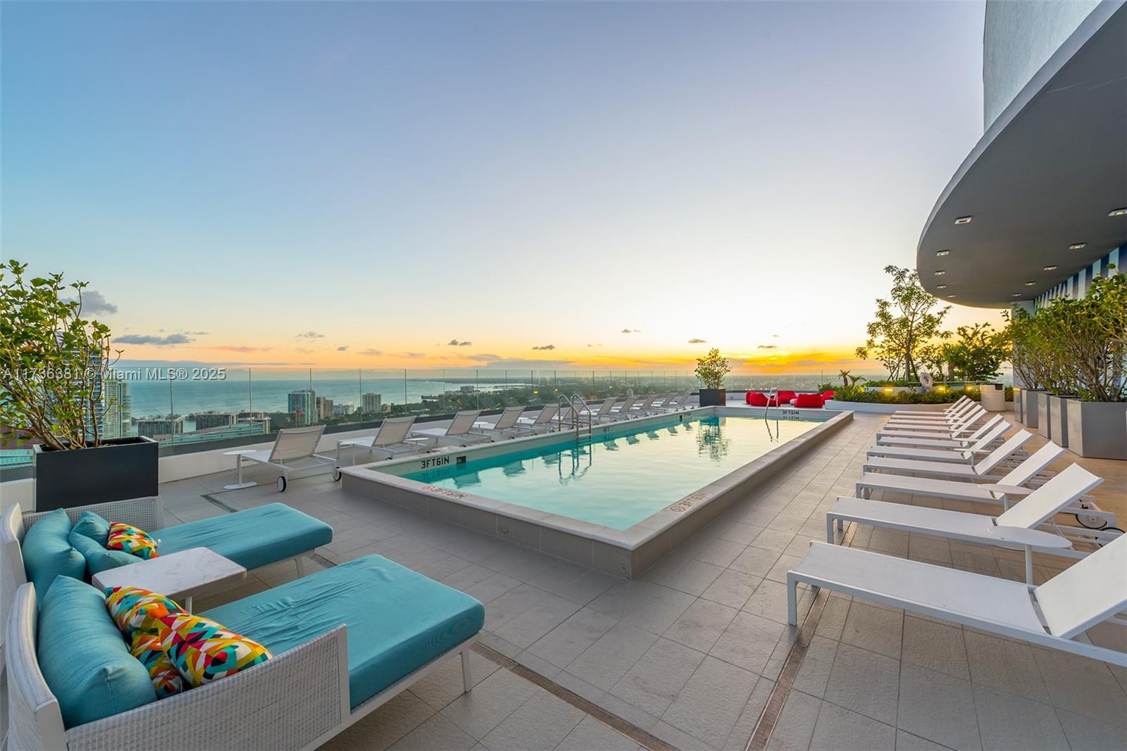 55 Southwest 9th Street, Unit 1701 Miami, FL 33130 - Photo 38 of 58 a view of a patio with couches and a table and chairs