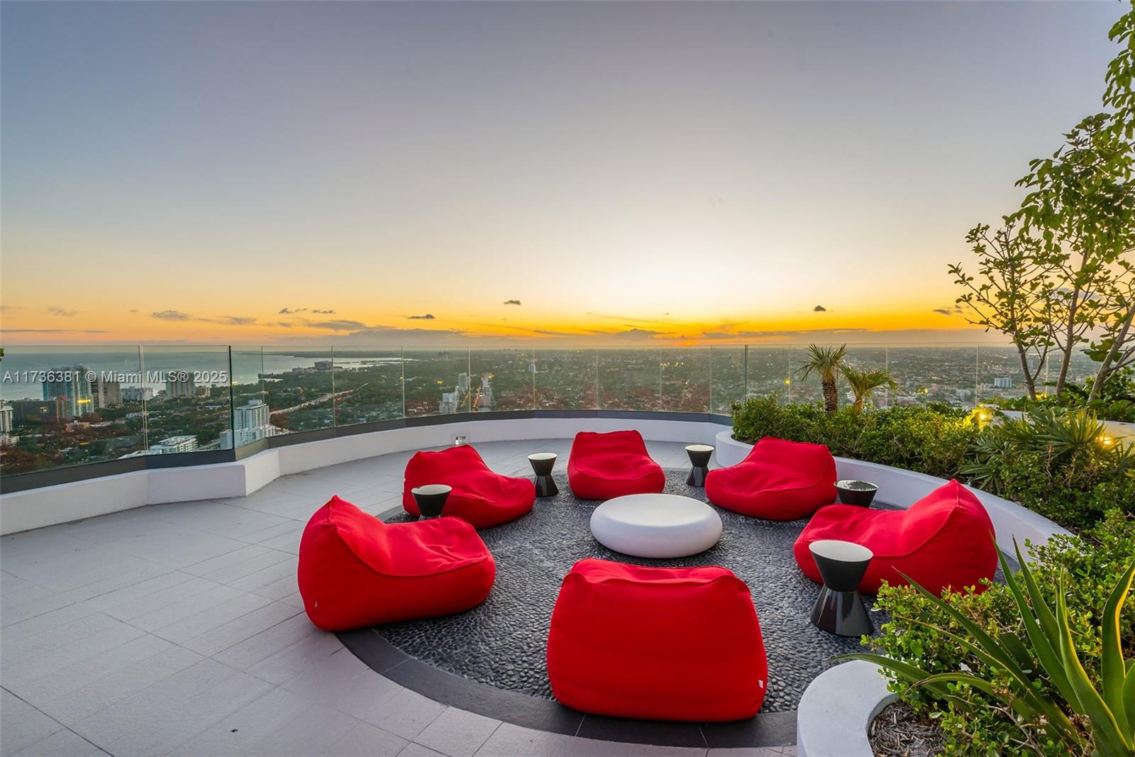 55 Southwest 9th Street, Unit 1701 Miami, FL 33130 - Photo 42 of 58 a view of table and chairs on the terrace