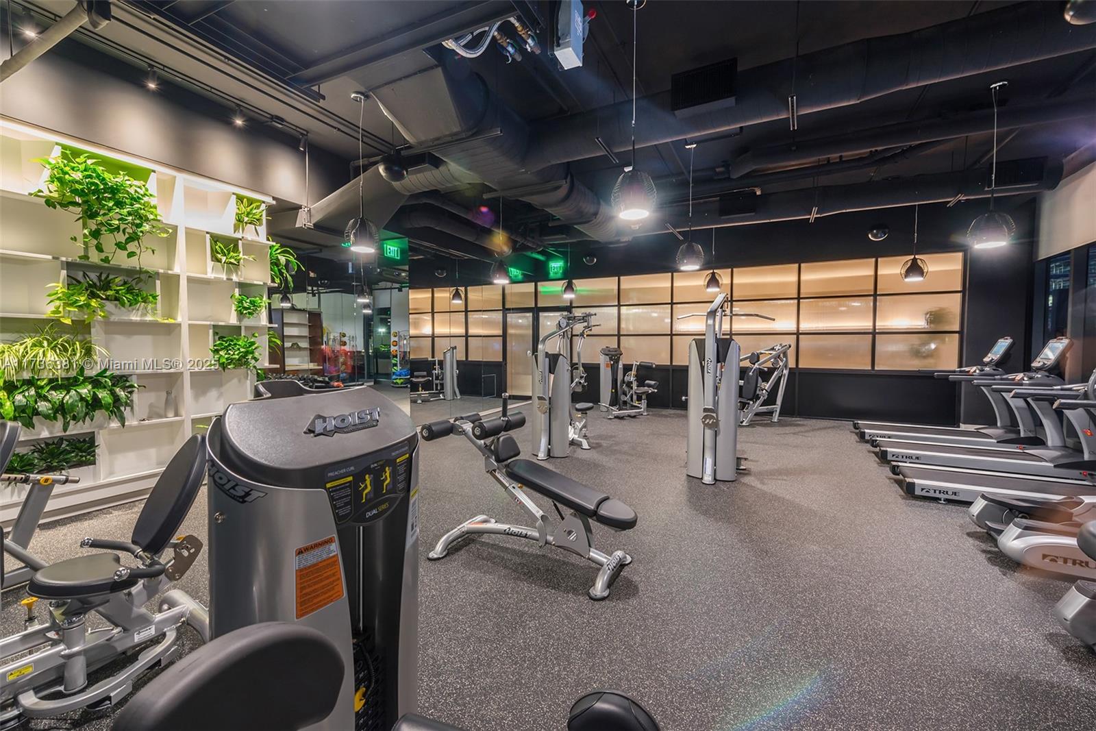 55 Southwest 9th Street, Unit 1701 Miami, FL 33130 - Photo 54 of 58 a view of a room with gym equipment