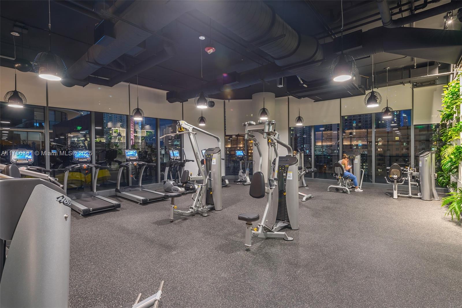 55 Southwest 9th Street, Unit 1701 Miami, FL 33130 - Photo 57 of 58 a view of a room with gym equipment