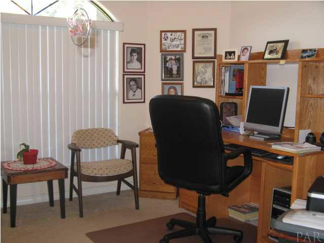 4921 Guernsey Road Pace, FL 32571 - Photo 13 of 22 The home office or, if you prefer, your future sitting room.