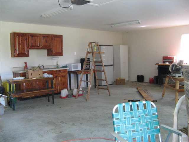 4921 Guernsey Road Pace, FL 32571 - Photo 8 of 22 Interior of the 24 x30 sq ft barn/ workshop.