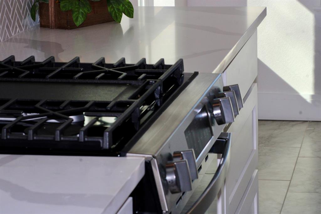 802 South Medora Street Terrell, TX 75160 - Photo 13 of 34 a view of car parked in garage