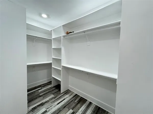 a room with walk in closet
