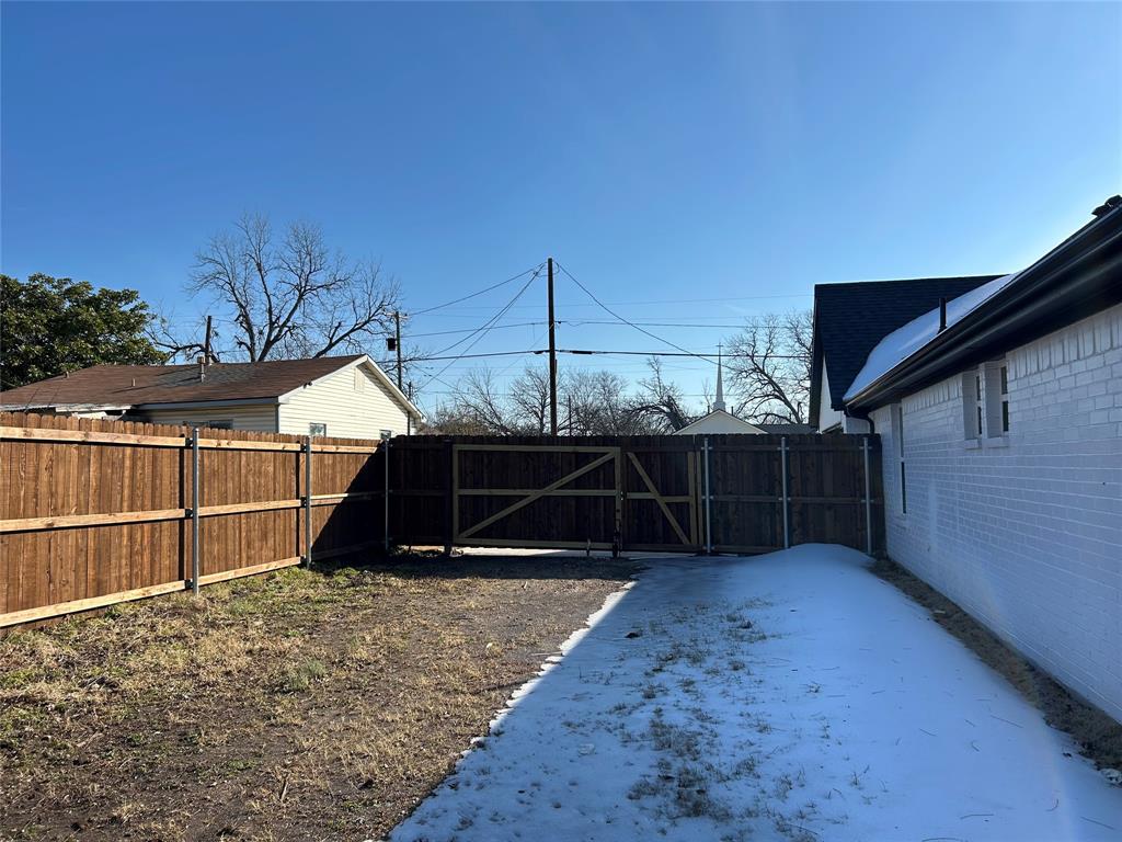 802 South Medora Street Terrell, TX 75160 - Photo 33 of 34 a view of backyard with small cabin
