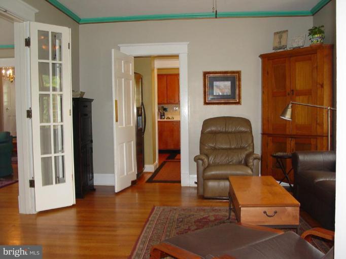 6305 Pinehurst Road Baltimore, MD 21212 - Photo 4 of 23 French doors lead to dining room used as den.