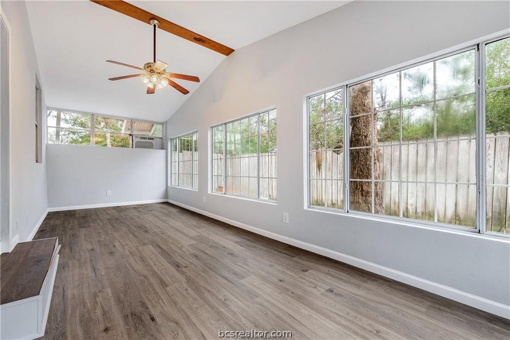 3755 West Villa Maria Road Bryan, TX 77807 - Photo 18 of 26 Unfurnished sunroom with vaulted ceiling with beams