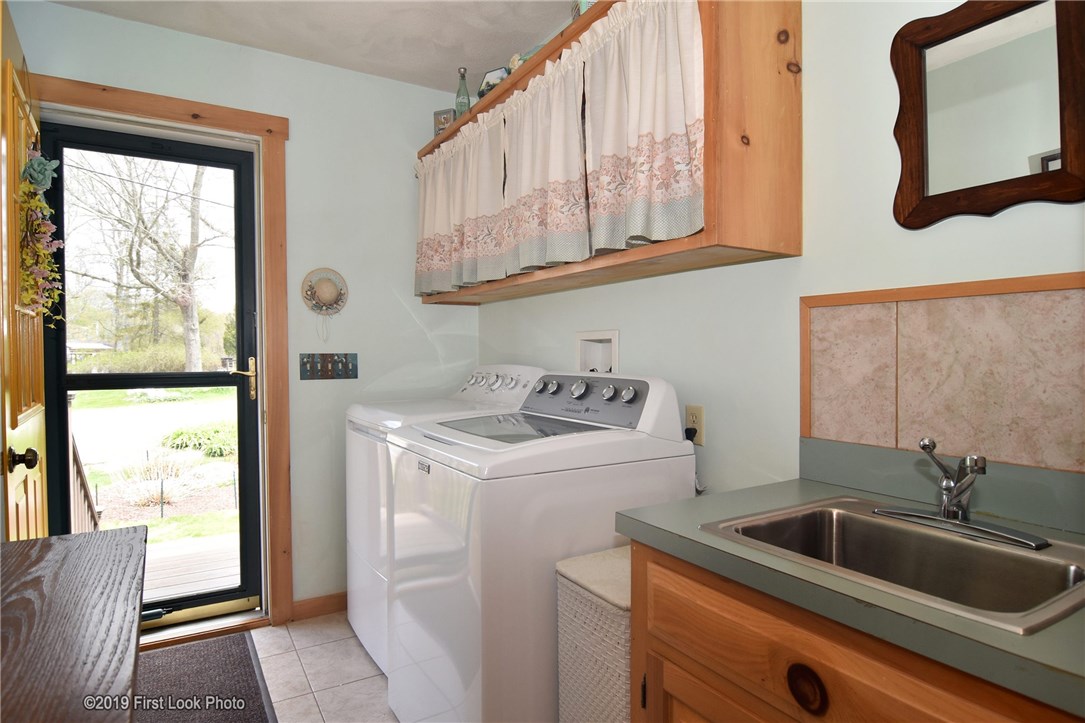 110 South Killingly Road Foster, RI 02825 - Photo 27 of 35 Laundry room and side entrance