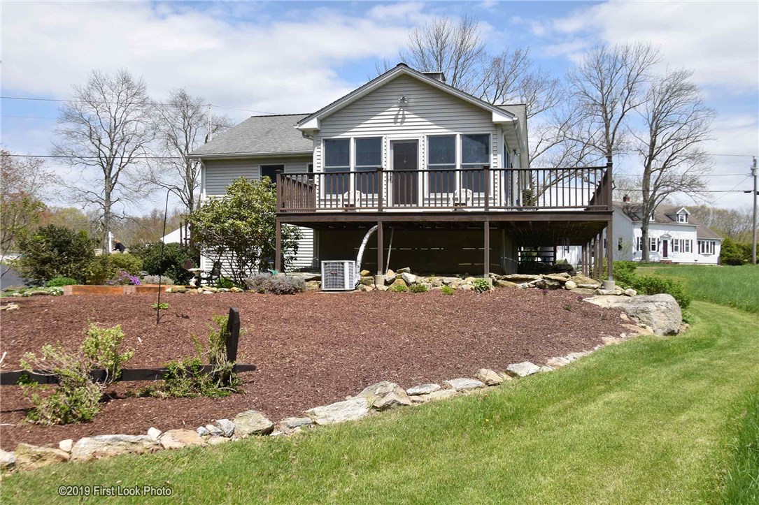 110 South Killingly Road Foster, RI 02825 - Photo 3 of 35 Side of house with sunroom