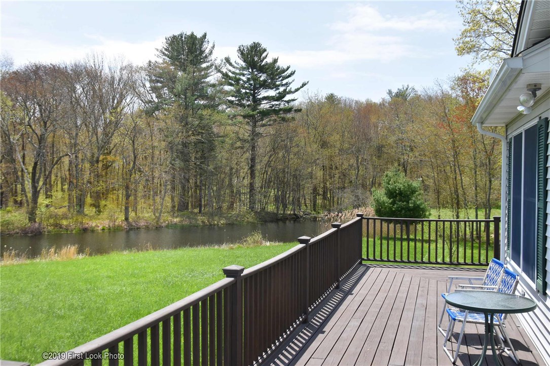 110 South Killingly Road Foster, RI 02825 - Photo 4 of 35 Beautiful wrap around deck overlooking the pond and your land