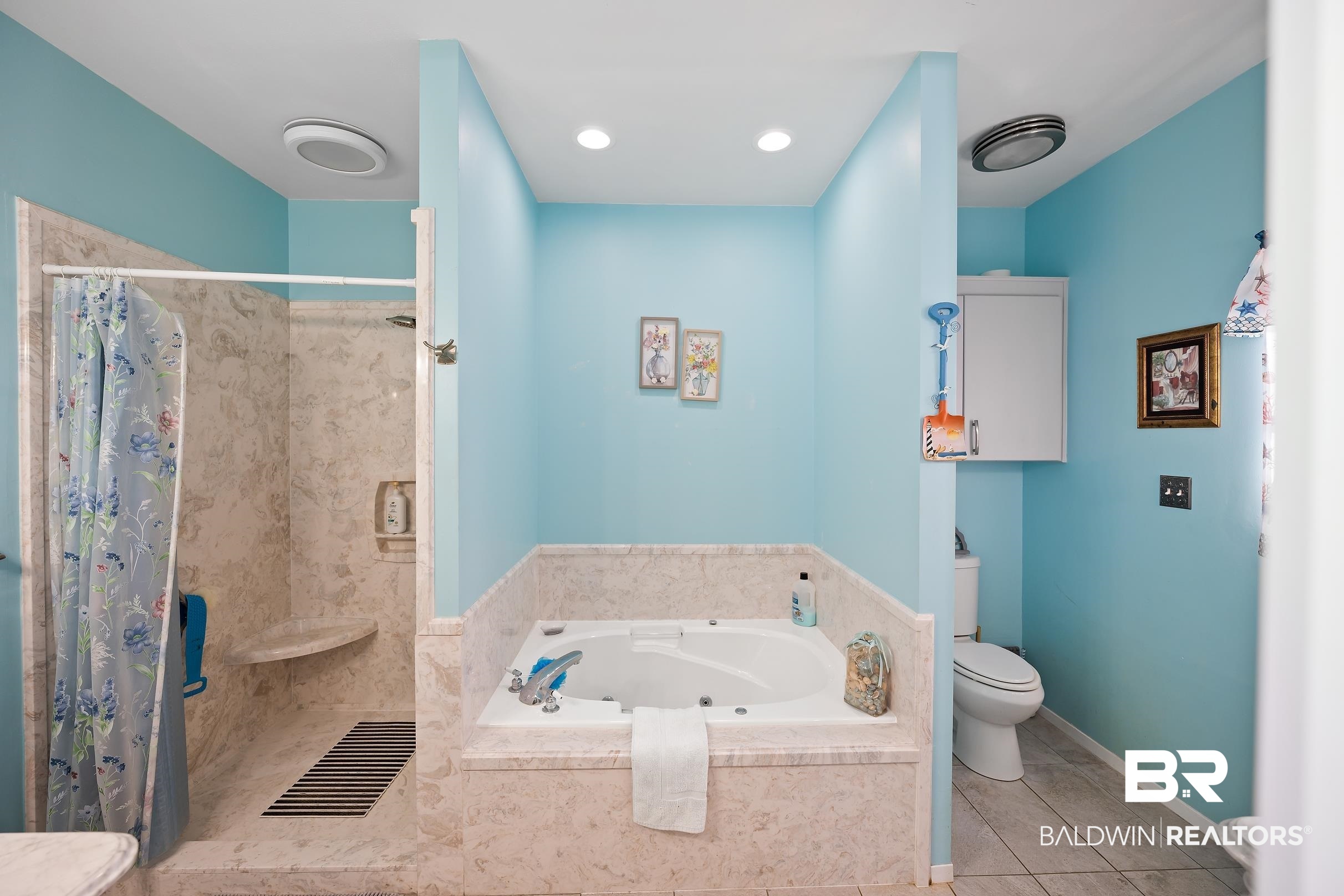 2674 Pine Ridge Drive Lillian, AL 36549 - Photo 14 of 42 Bathroom featuring a tub with jets, a stall shower, tile patterned floors, and recessed lighting