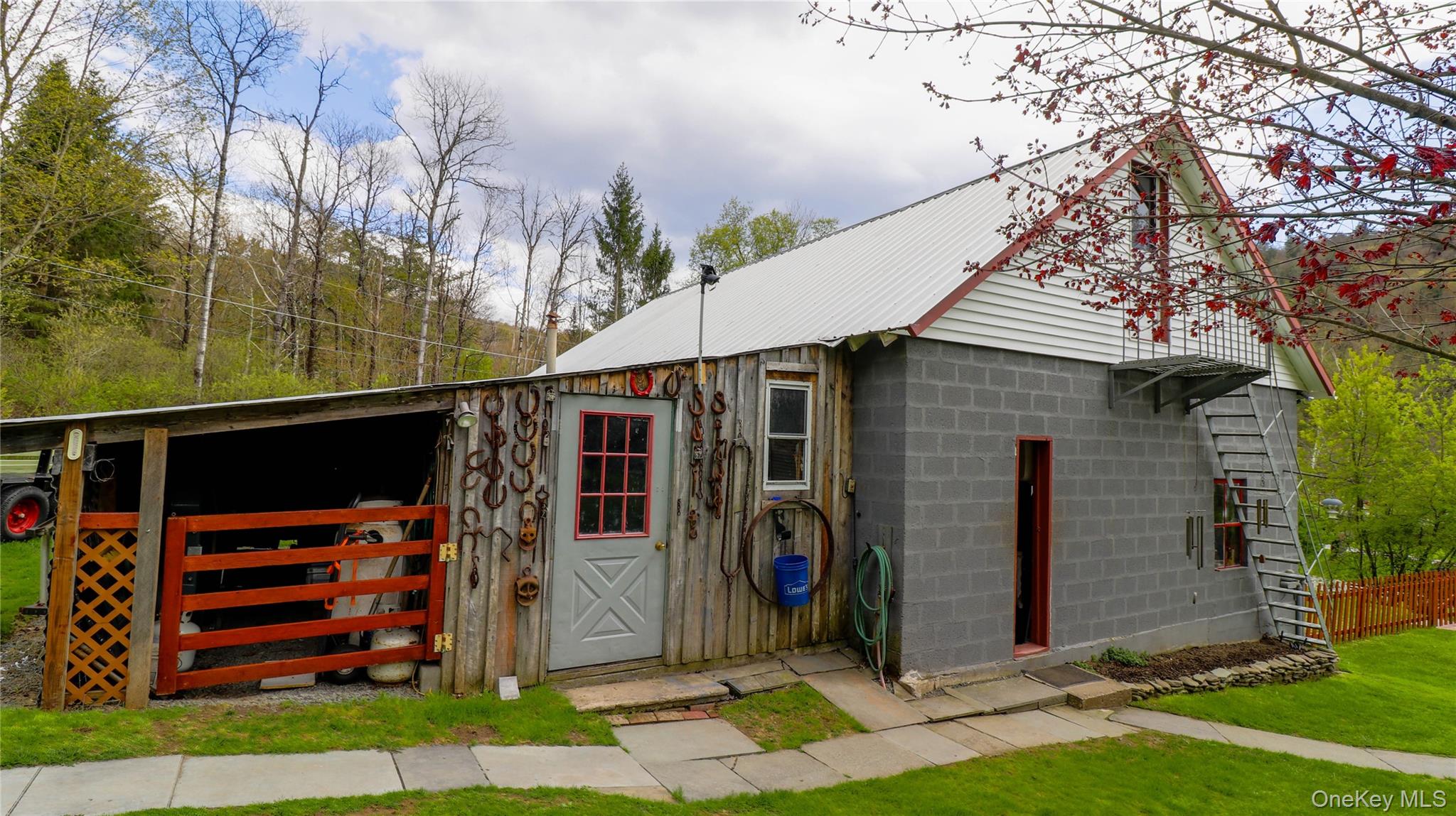 11 Hood Road Roscoe, NY 12776 - Photo 25 of 31 Rustic barn structure featuring a metal roof and a mix of wood siding and concrete block construction