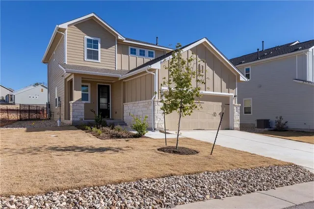 a view of a house with snow