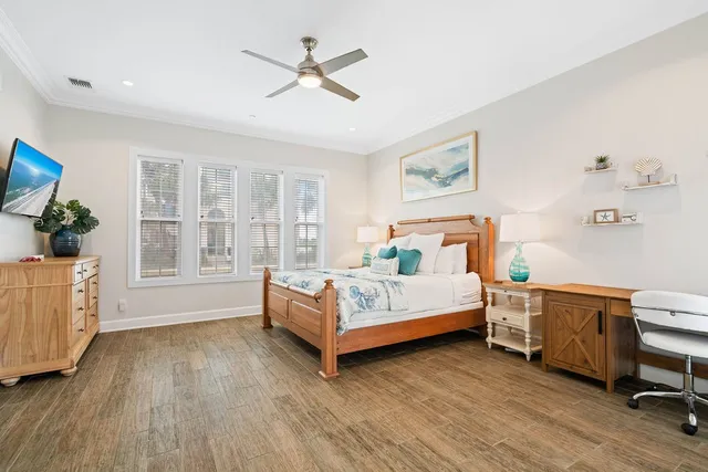 a bed room with a bed and a window