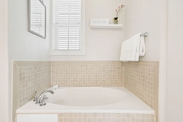 a bathroom with a bathtub