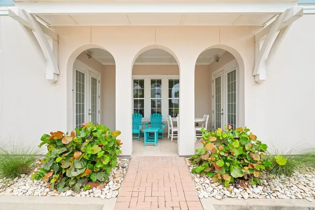 an aerial view of a house with outdoor space