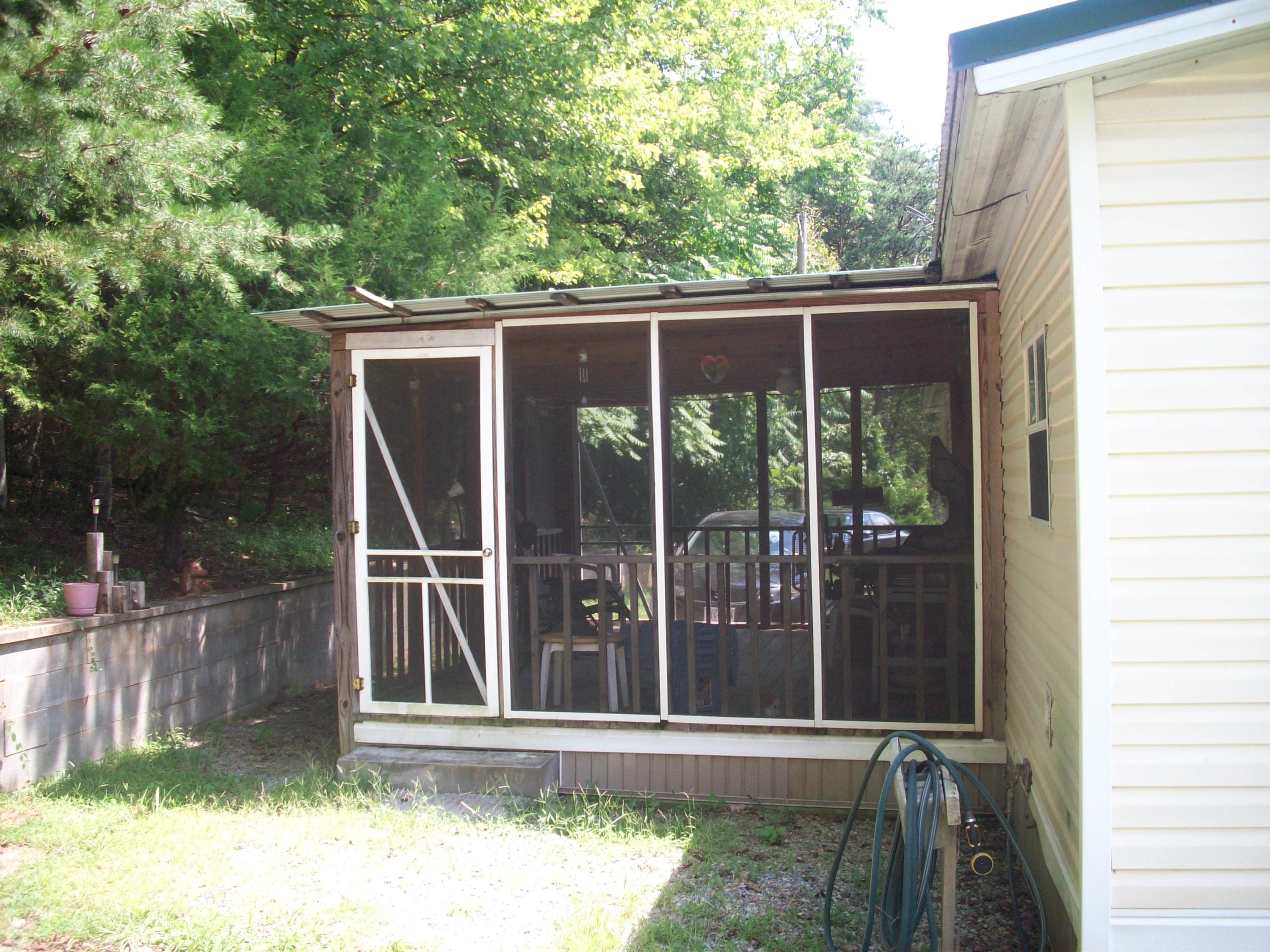 205 Board Mountain Road Goodview, VA 24095 - Photo 15 of 17 a view of a backyard of the house