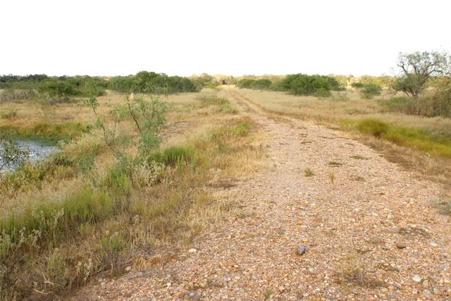a view of a lake with a house