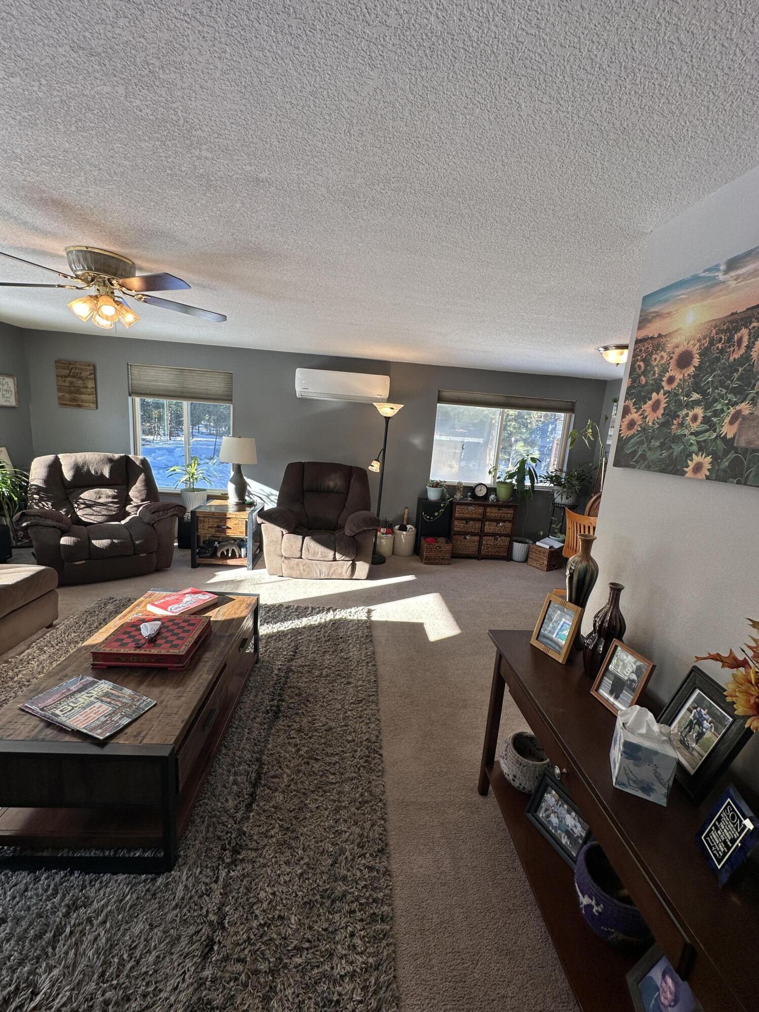 123977 Surveyor Road Crescent Lake, OR 97733 - Photo 10 of 41 a living room with furniture a window and a table