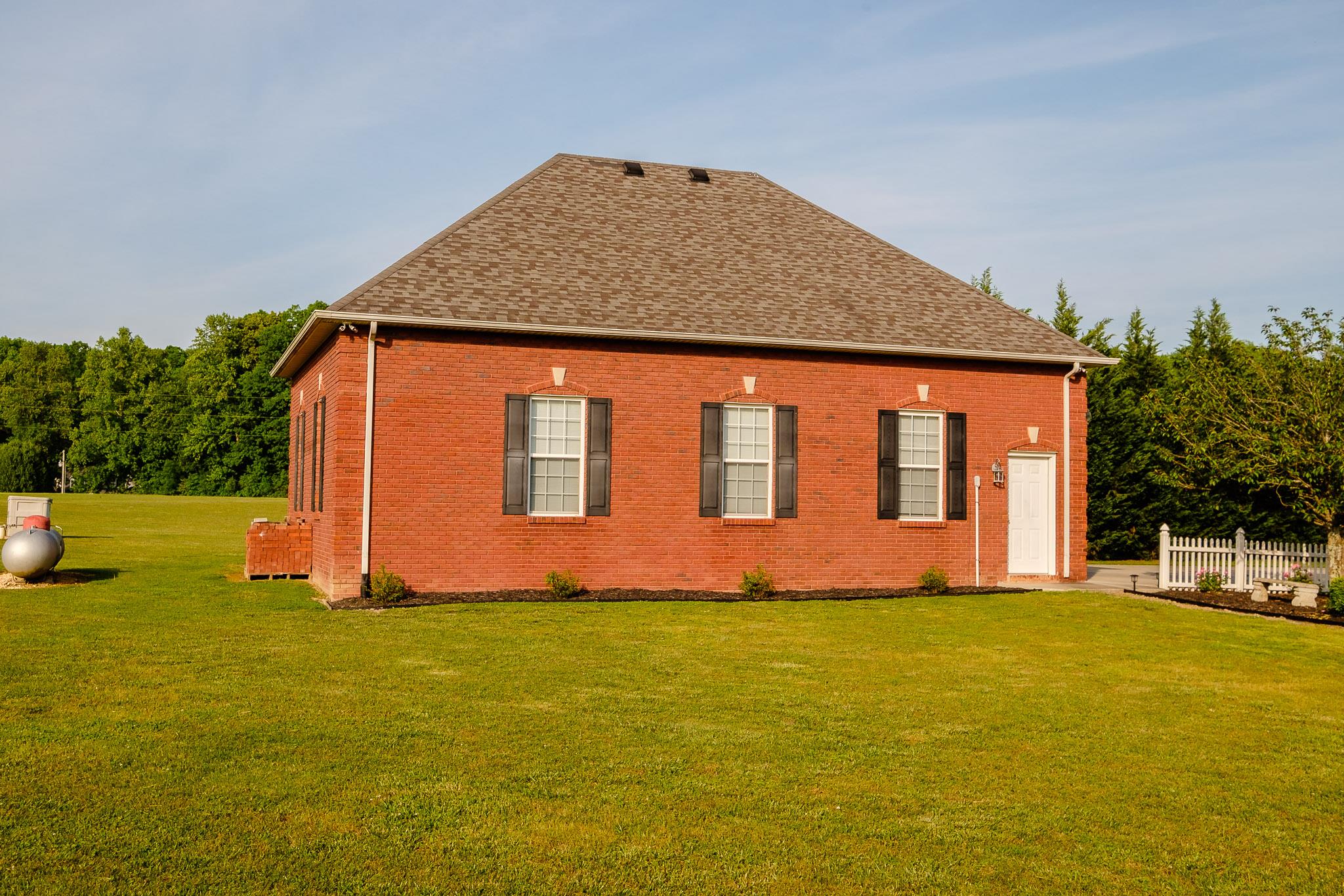 329 Urban Farms Road Manchester, TN 37355 - Photo 3 of 29 a front view of house with yard