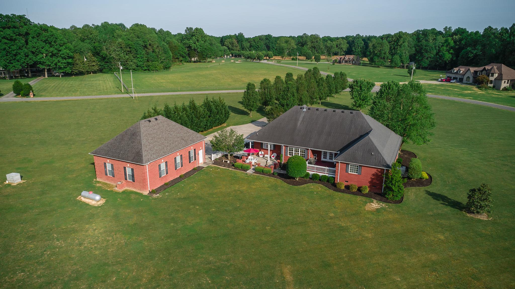 329 Urban Farms Road Manchester, TN 37355 - Photo 5 of 29 a view of a house with a big yard