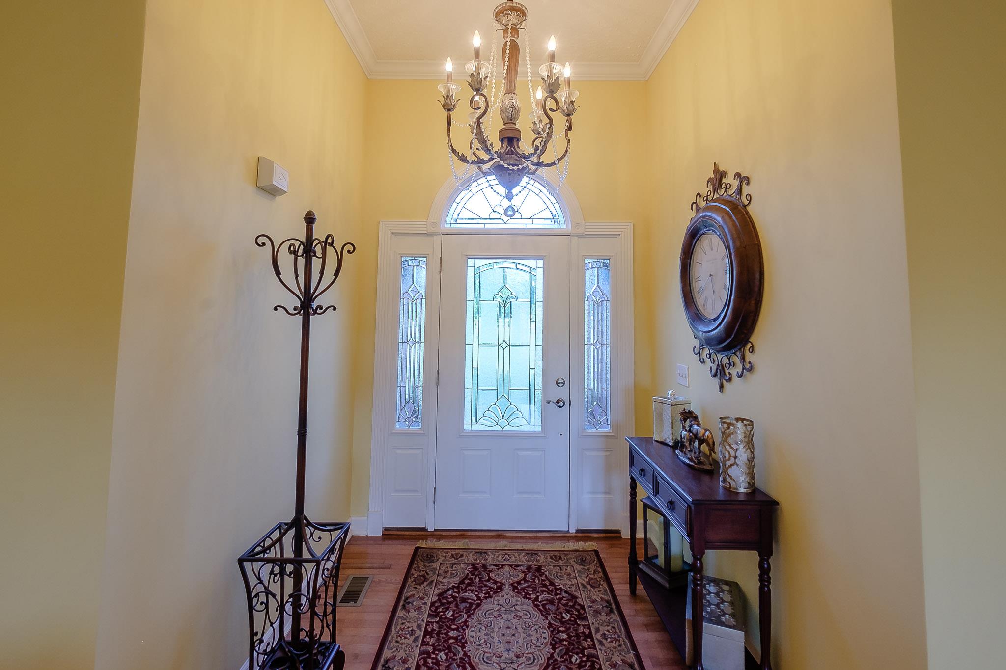 329 Urban Farms Road Manchester, TN 37355 - Photo 6 of 29 a front view of a house with mirror and furniture