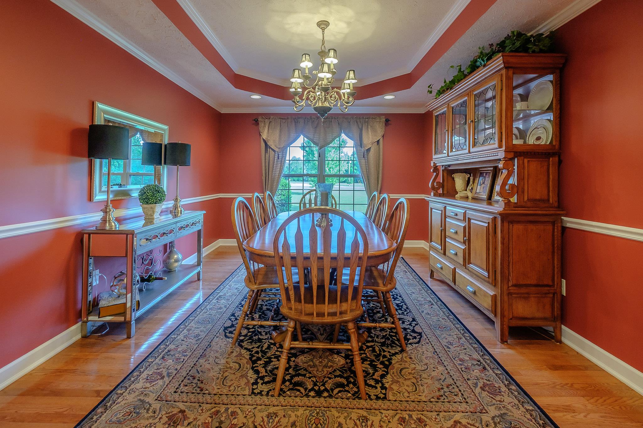 329 Urban Farms Road Manchester, TN 37355 - Photo 10 of 29 a view of a dining room with furniture window and wooden floor